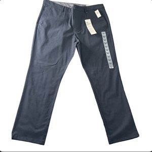 NWT 38x30 men’s dress up pants. Very dark blue with small grayish dots.